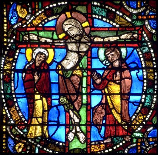 Dit paneel heet ‘de kruisiging’ en is onderdeel van ‘de passie’, raam 51 in de Chartres Kathedraal. De foto is gemaakt door Dr Stuart Whatling en met toestemming overgenomen van zijn site “The Corpus of Medieval Narrative Art” (zie http://www.medievalart.org.uk).  